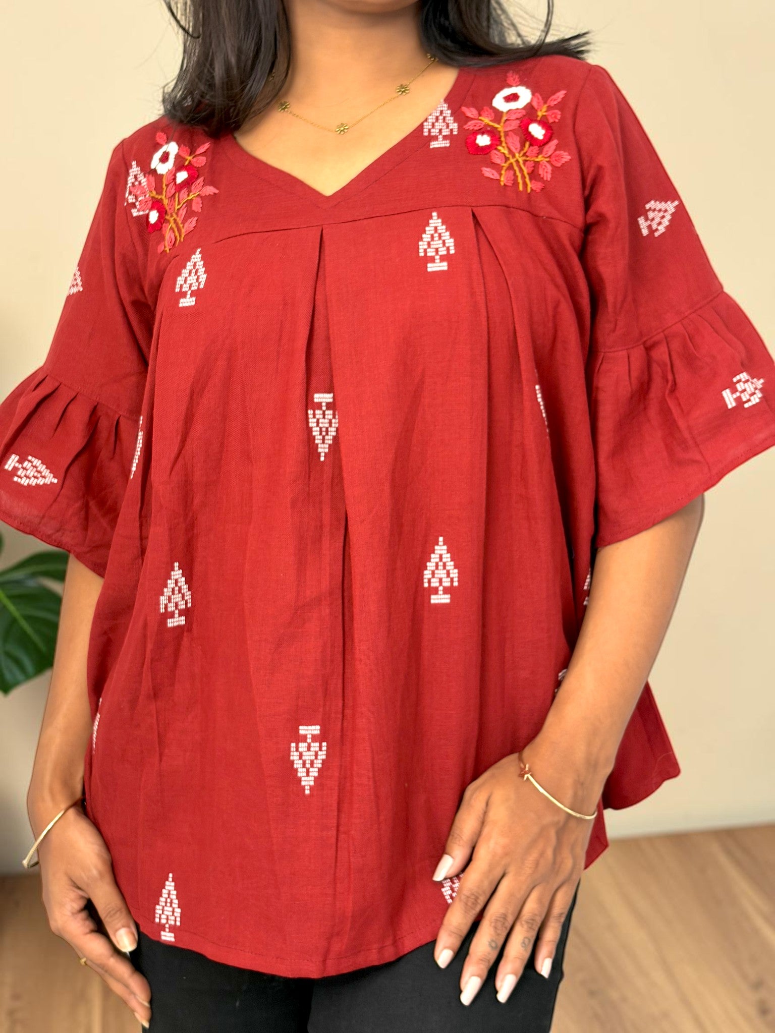 Poppy Field Embroidered Peplum Top — Maroon