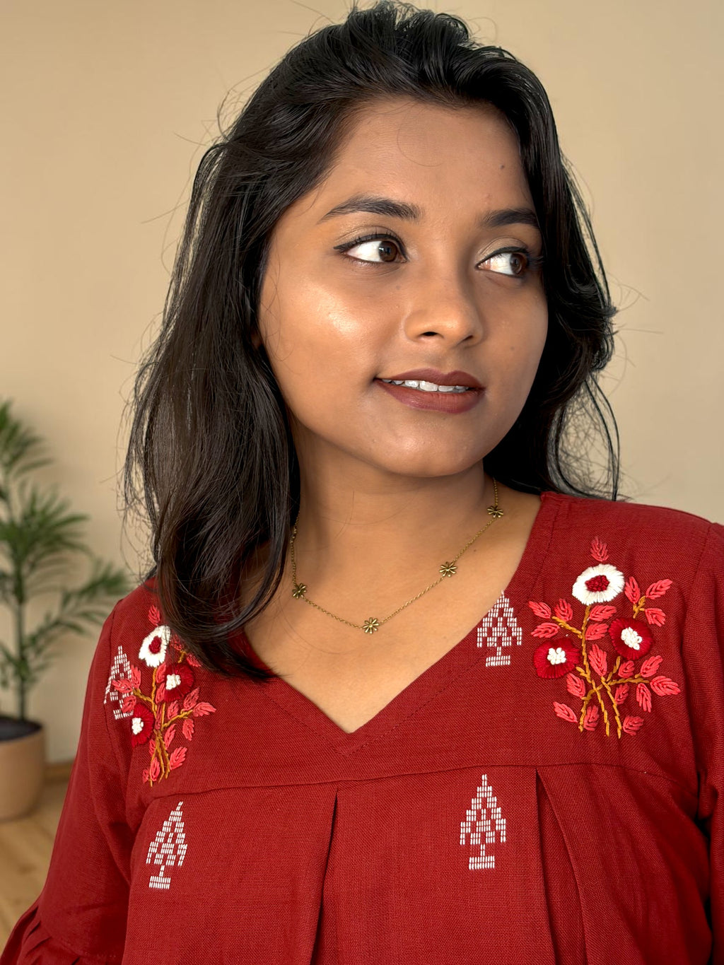 Poppy Field Embroidered Peplum Top — Maroon