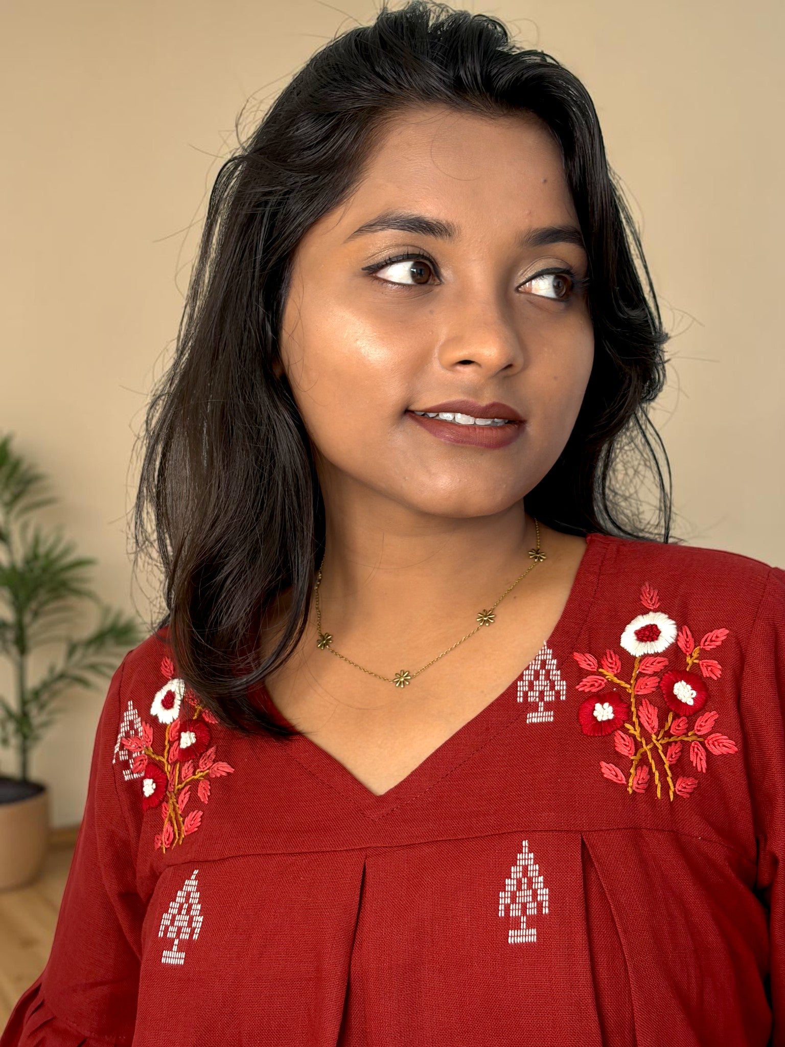 Poppy Field Embroidered Peplum Top — Maroon