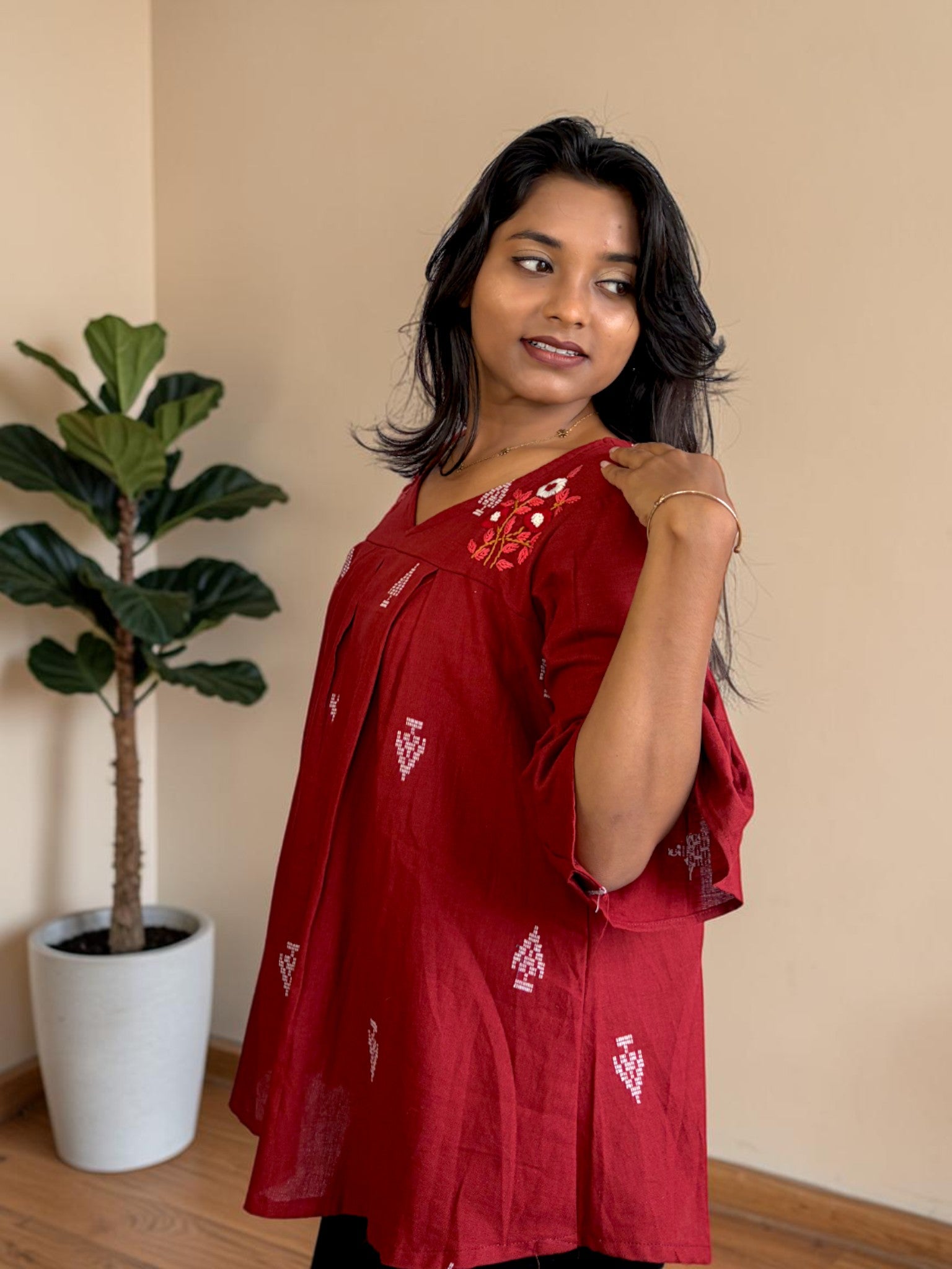 Poppy Field Embroidered Peplum Top — Maroon